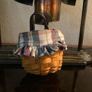 Longaberger mini Gatehouse Basket with plaid over the top liner.